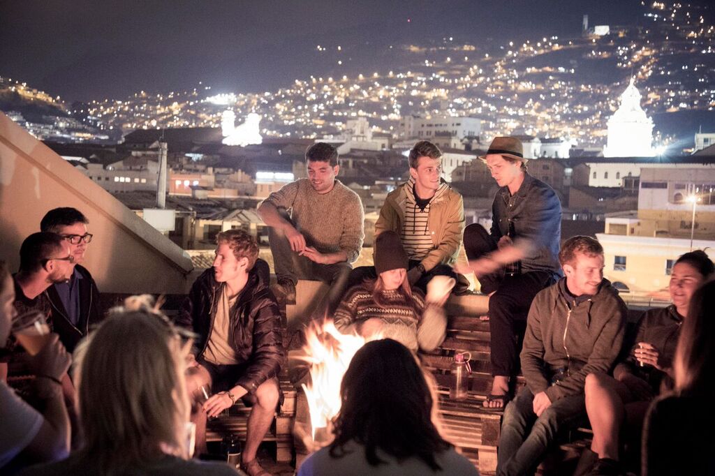 Young people on the terrace of the Community Hostel, Quito.